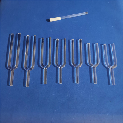Tenedor de afinación de cristal claro un conjunto con 7 notas musicales y un empaque fuerte